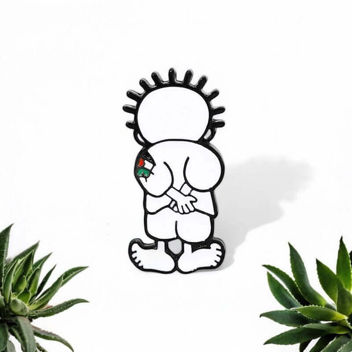 Handala pin badge featuring iconic Palestinian character symbolizing resilience and hope amidst occupation, designed by Naji al-Ali