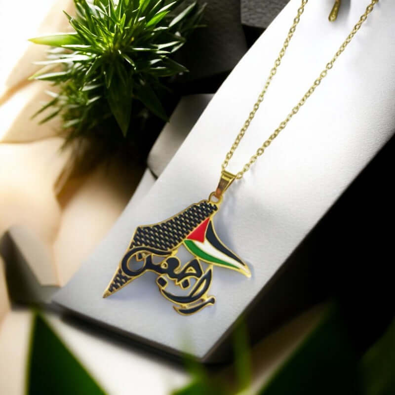 Palestine Map Necklace featuring the powerful Arabic word "راجعين"