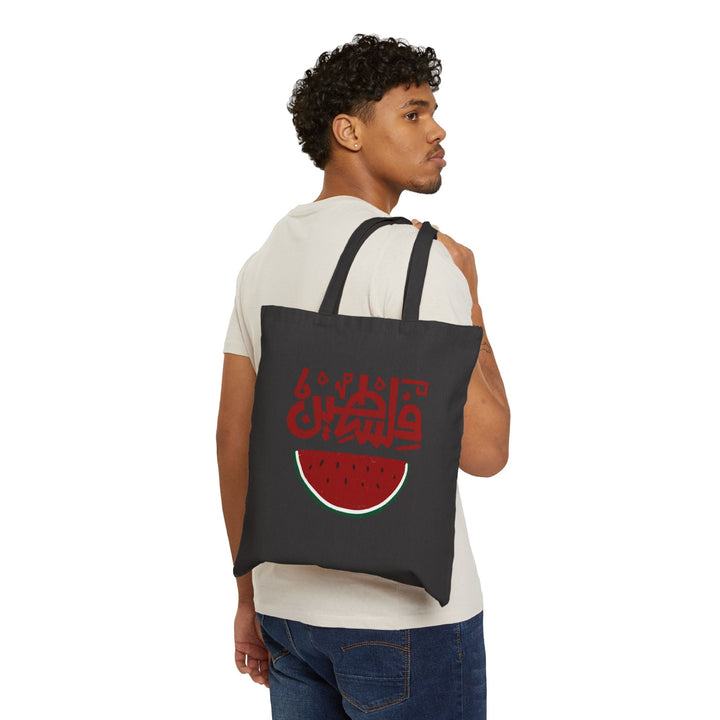 Taste of Resistance: Palestine Watermelon Tote Bag - The Kufiya ShopTaste of Resistance: Palestine Watermelon Tote BagBagsPrintifyThe Kufiya Shop92879071393362854731Black15" x 16"Taste of Resistance: Palestine Watermelon Tote Bag